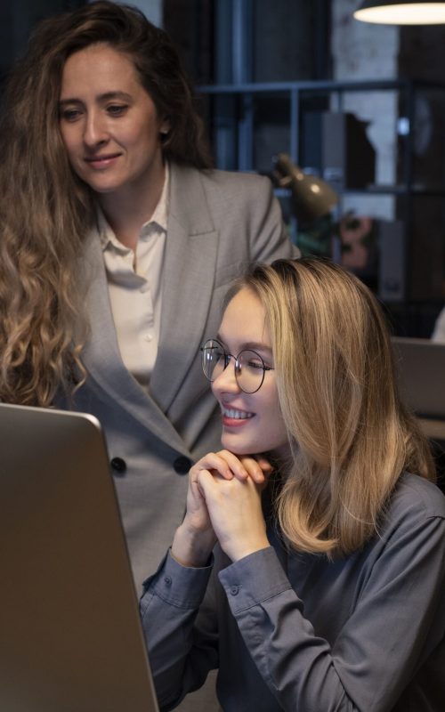 coworkers-looking-monitor